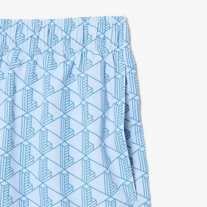 Mellanglånga boxerkalsonger med monogramtryck Mellanglånga boxerkalsonger med monogramtryck