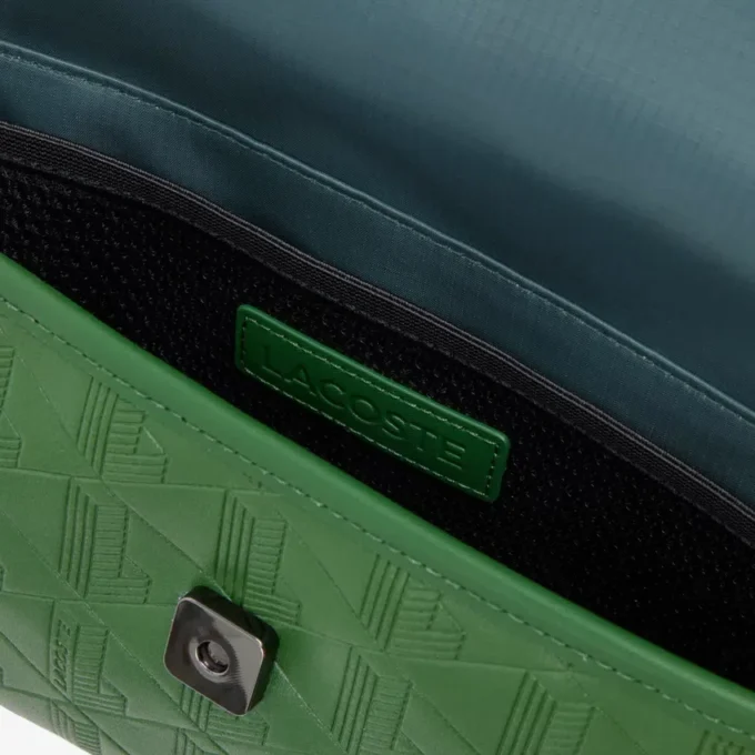 Mini-messengerväska i läder med monogram