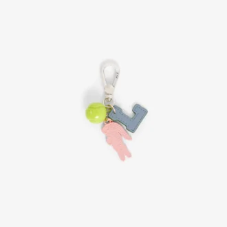 Nyckelring med tennisboll och krokodil-charm
