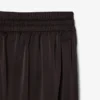 Oversized-byxor i satin med resår Oversized-byxor i satin med resår
