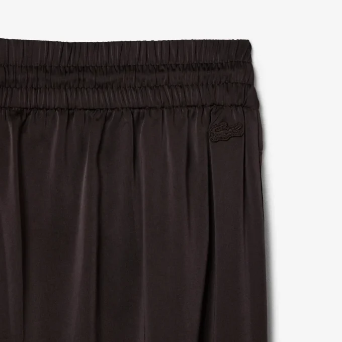 Oversized-byxor i satin med resår Oversized-byxor i satin med resår
