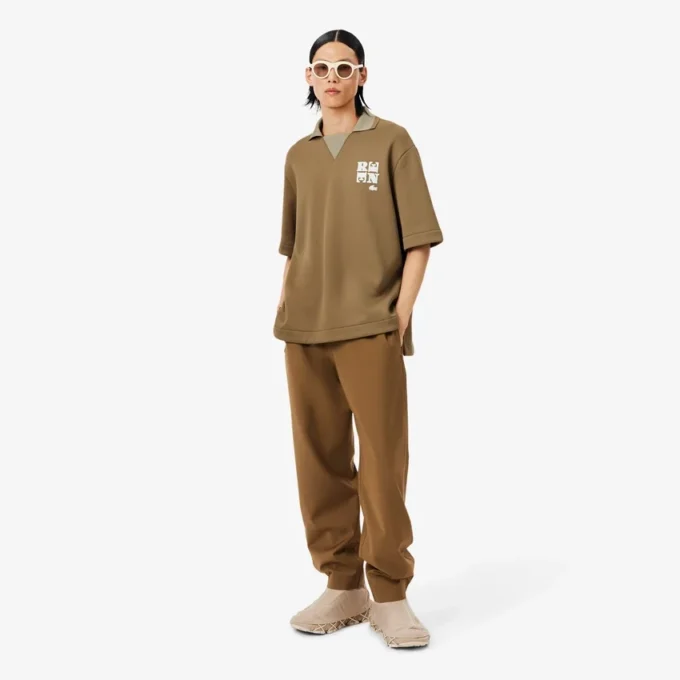 Oversized satinpikétröja med Runway-märke Oversized satinpikétröja med Runway-märke