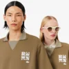 Oversized satinpikétröja med Runway-märke Oversized satinpikétröja med Runway-märke