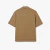 Oversized satinpikétröja med Runway-märke Oversized satinpikétröja med Runway-märke