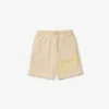 Oversized shorts i ekologisk bomullsfleece med krokodiltryck för herr Oversized shorts i ekologisk bomullsfleece med krokodiltryck för herr