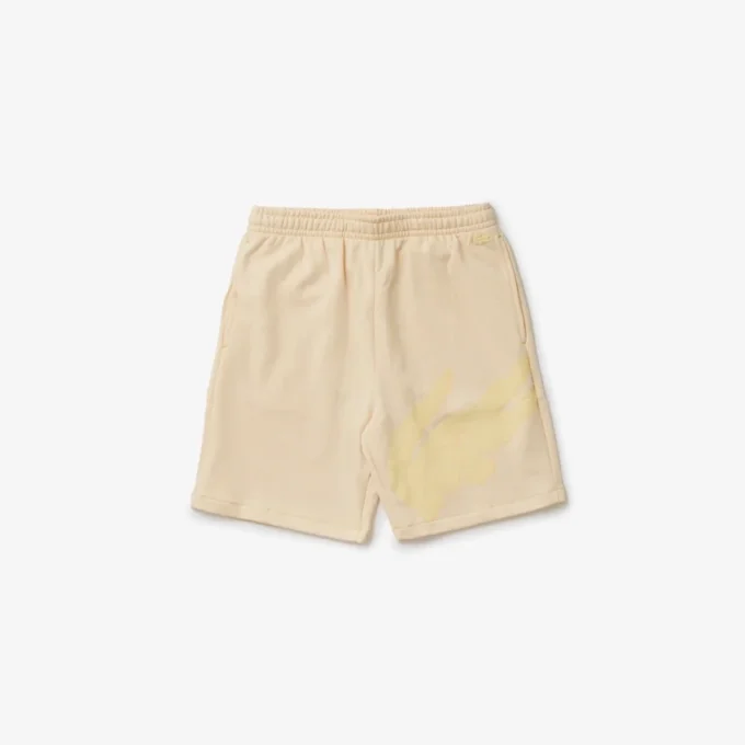 Oversized shorts i ekologisk bomullsfleece med krokodiltryck för herr Oversized shorts i ekologisk bomullsfleece med krokodiltryck för herr