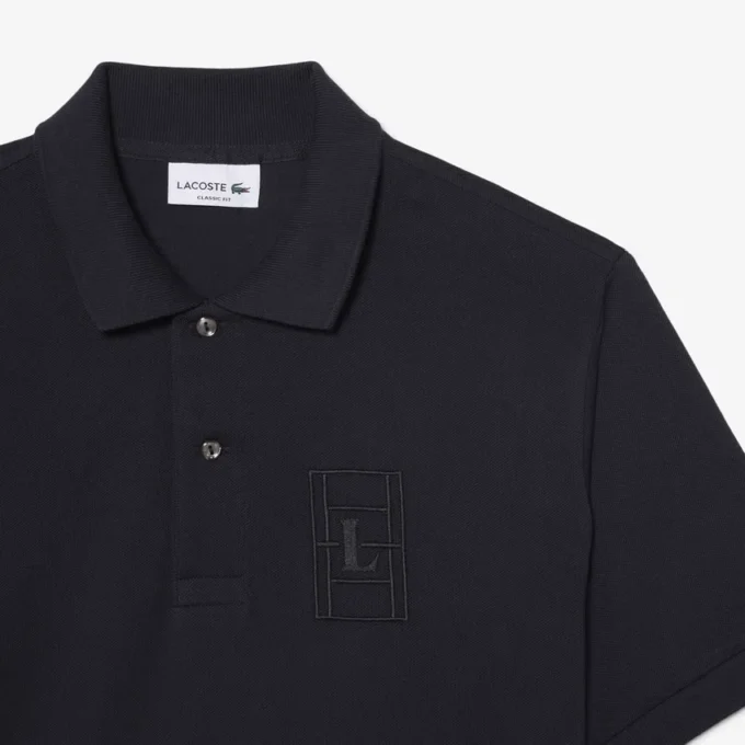 Petit Piqua-pikétröja med klassisk passform och broderade detaljer