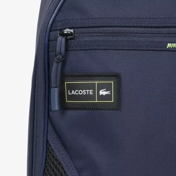 Play in Lacoste-ryggsäck
