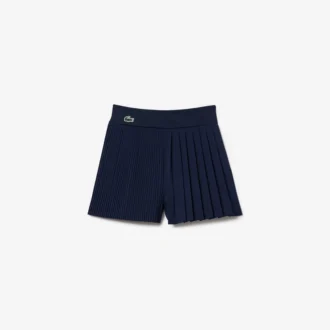 Plisserade fodrade tennisshorts för dam