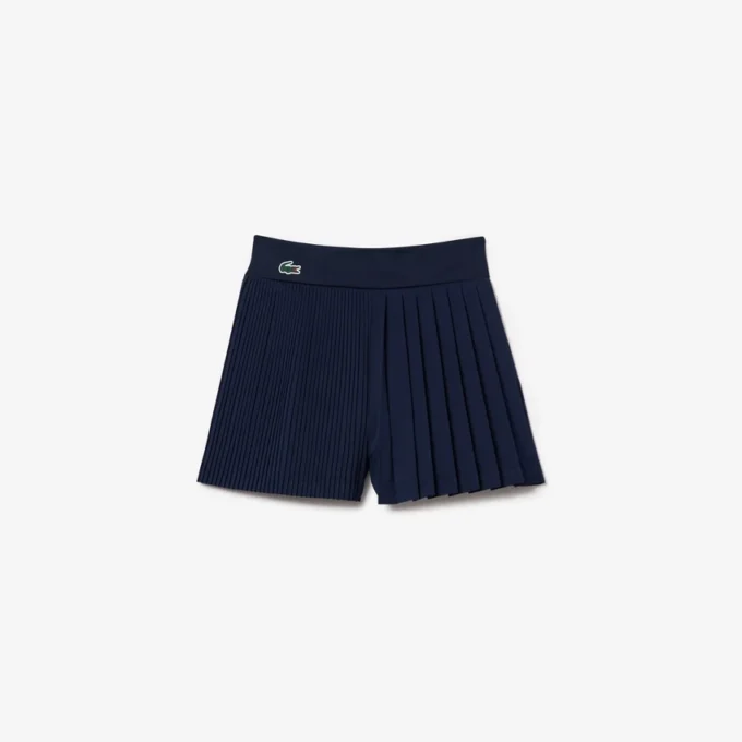 Plisserade fodrade tennisshorts för dam Plisserade fodrade tennisshorts för dam