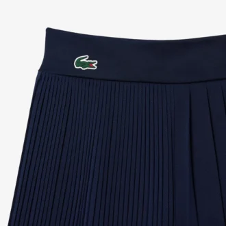 Plisserade fodrade tennisshorts för dam