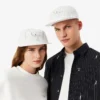 Randig broderad keps i bomullstwill Randig broderad keps i bomullstwill