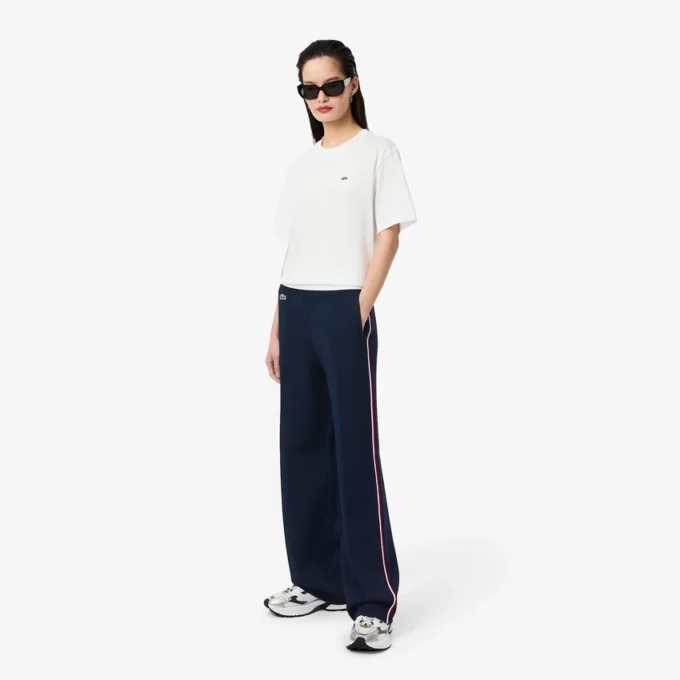 Randiga sweatpants med utsvängda ben för dam Randiga sweatpants med utsvängda ben för dam