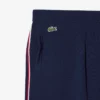 Randiga sweatpants med utsvängda ben för dam Randiga sweatpants med utsvängda ben för dam