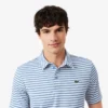 Regular Fit Ultra Dry randig golfpikétröja Regular Fit Ultra Dry randig golfpikétröja
