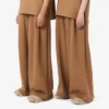 Runway-joggingbyxor i plisserad satin Runway-joggingbyxor i plisserad satin