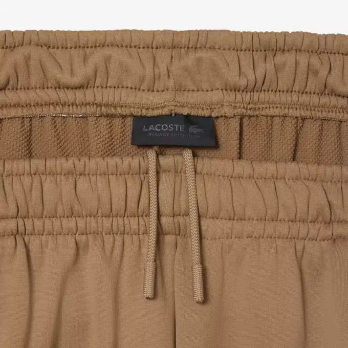 Runway-joggingbyxor i plisserad satin Runway-joggingbyxor i plisserad satin