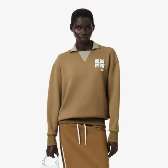 Runway-pikétröja med krage och badge-detalj