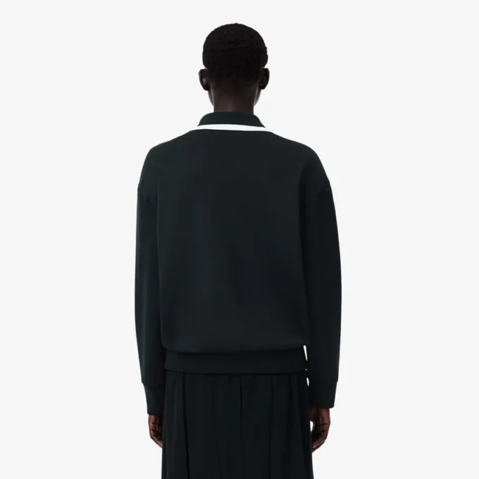Runway-pikétröja med krage och badge-detalj