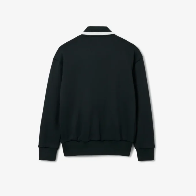 Runway-pikétröja med krage och badge-detalj