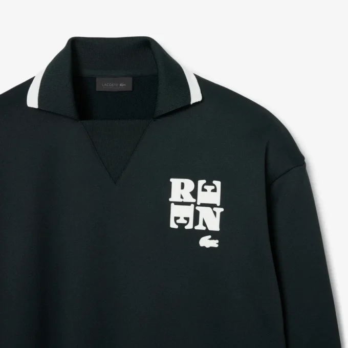 Runway-pikétröja med krage och badge-detalj