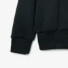 Runway-pikétröja med krage och badge-detalj