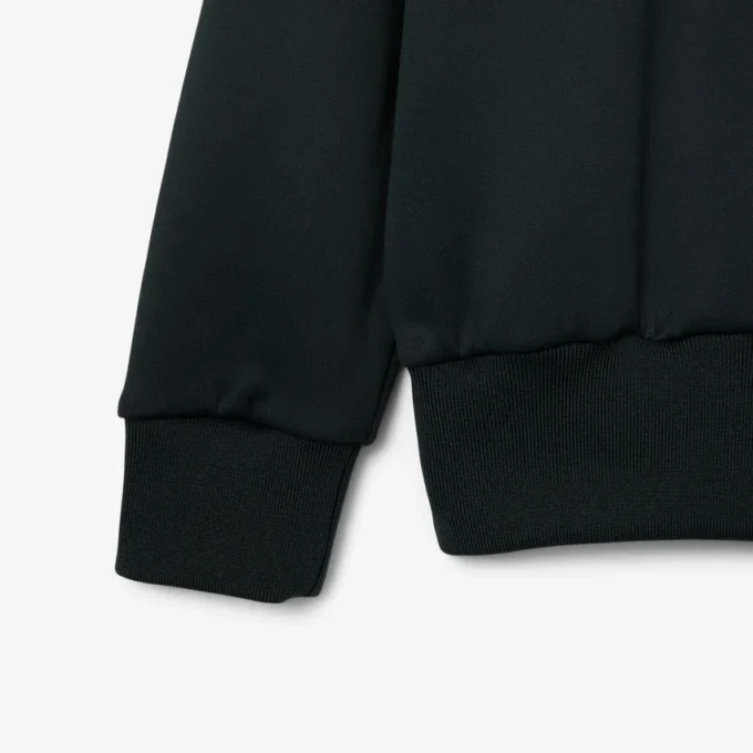 Runway-pikétröja med krage och badge-detalj