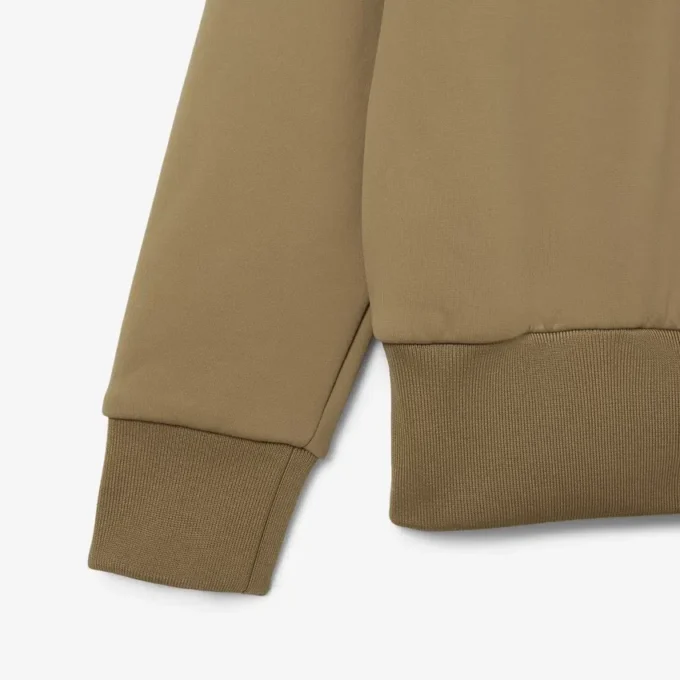 Runway-pikétröja med krage och badge-detalj