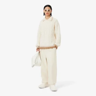 Runway-tröja i ull med polokrage och kabelstickning