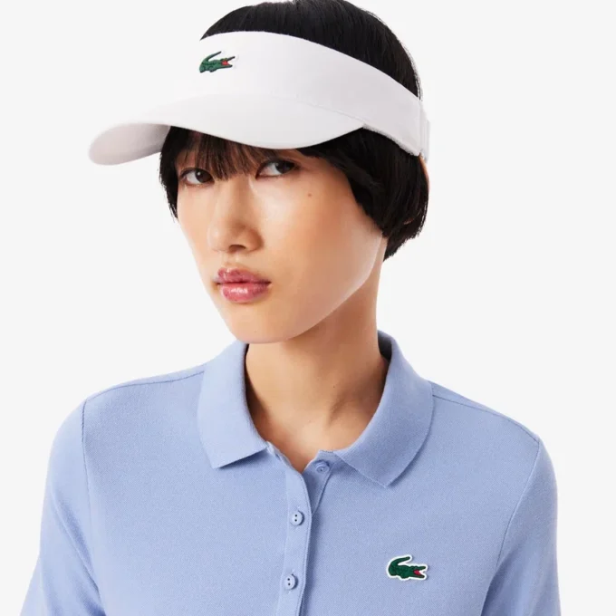 Slim fit-pikétröja för damer med värmereglerande egenskaper Slim fit-pikétröja för damer med värmereglerande egenskaper
