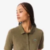 Slim fit-pikétröja för damer med värmereglerande egenskaper Slim fit-pikétröja för damer med värmereglerande egenskaper