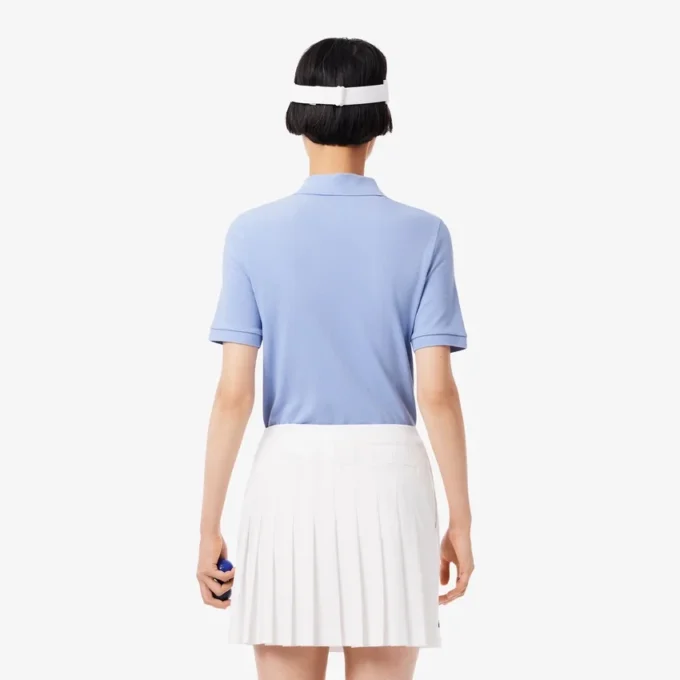 Slim fit-pikétröja för damer med värmereglerande egenskaper Slim fit-pikétröja för damer med värmereglerande egenskaper