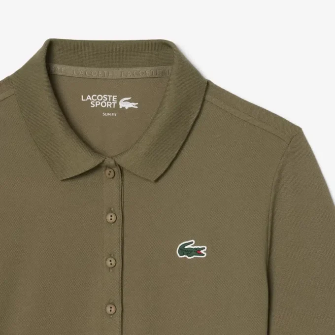Slim fit-pikétröja för damer med värmereglerande egenskaper Slim fit-pikétröja för damer med värmereglerande egenskaper