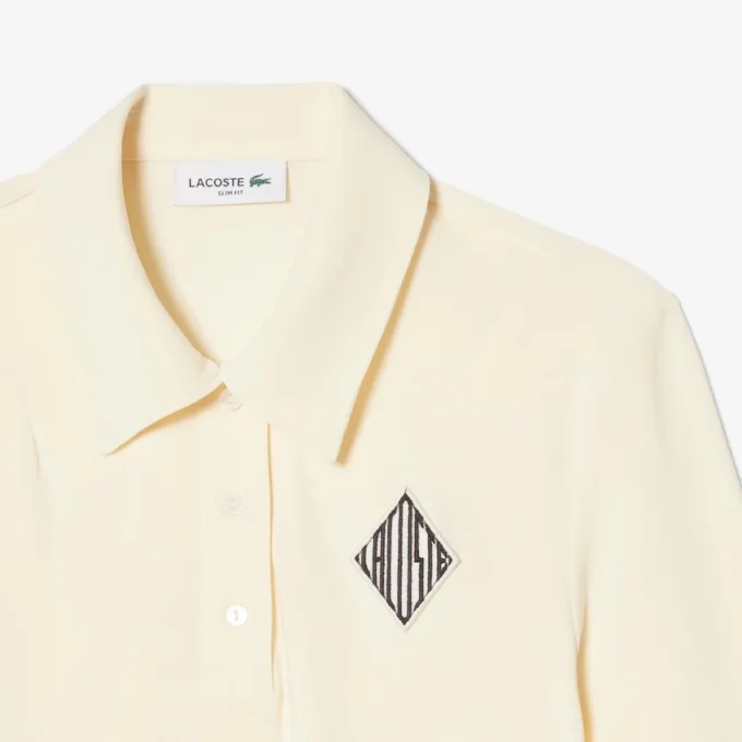 Slim fit-pikétröja med broderi Slim fit-pikétröja med broderi