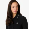 Slim fit-pikétröja med diamantmönster och krokodilkrage för dam Slim fit-pikétröja med diamantmönster och krokodilkrage för dam