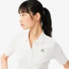 Slim fit-pikétröja med Pointelle-mönster och L.12.D-logotyp för dam
