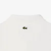 Slim fit-pikétröja med Pointelle-mönster och L.12.D-logotyp för dam