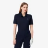 Slim fit-pikétröja med UV-skydd och stretch för damer Slim fit-pikétröja med UV-skydd och stretch för damer