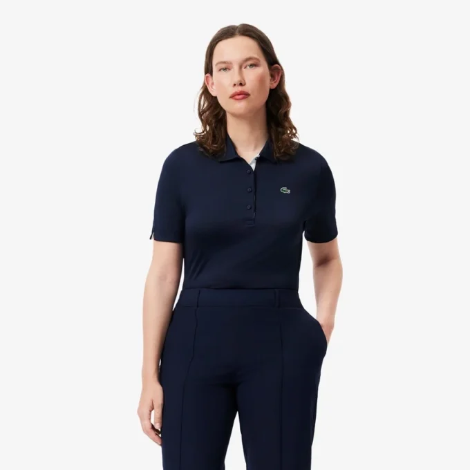 Slim fit-pikétröja med UV-skydd och stretch för damer Slim fit-pikétröja med UV-skydd och stretch för damer