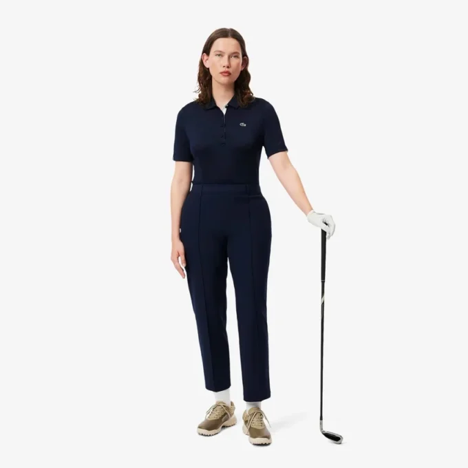 Slim fit-pikétröja med UV-skydd och stretch för damer Slim fit-pikétröja med UV-skydd och stretch för damer