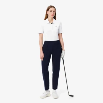 Slim fit-pikétröja med UV-skydd och stretch för damer