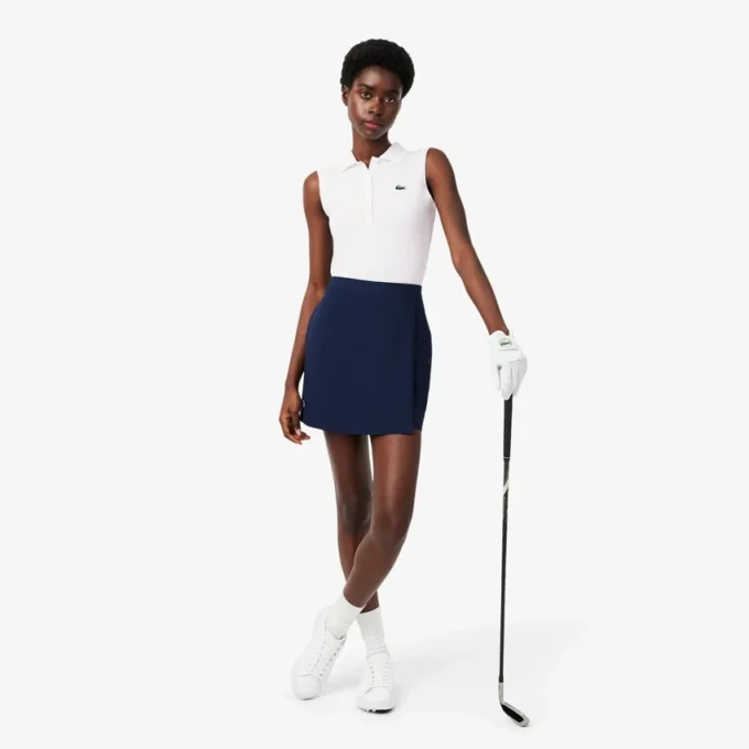 Slim fit-pikétröja med UV-skydd och stretch för damer Slim fit-pikétröja med UV-skydd och stretch för damer