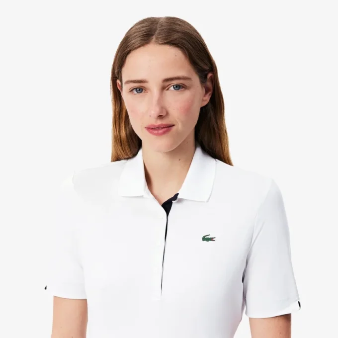 Slim fit-pikétröja med UV-skydd och stretch för damer Slim fit-pikétröja med UV-skydd och stretch för damer