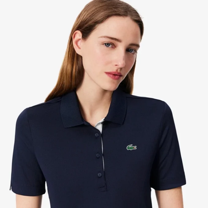 Slim fit-pikétröja med UV-skydd och stretch för damer Slim fit-pikétröja med UV-skydd och stretch för damer