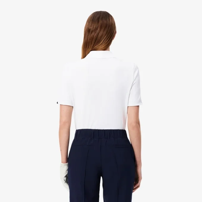 Slim fit-pikétröja med UV-skydd och stretch för damer Slim fit-pikétröja med UV-skydd och stretch för damer