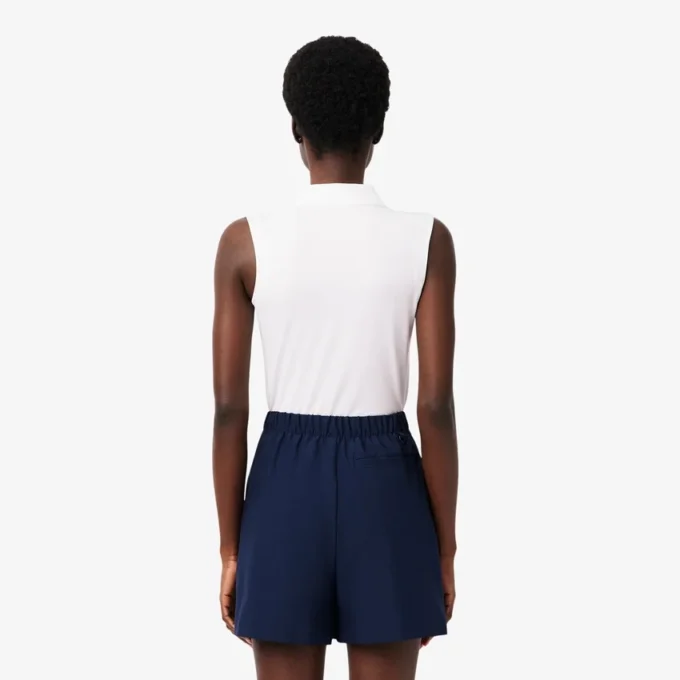 Slim fit-pikétröja med UV-skydd och stretch för damer Slim fit-pikétröja med UV-skydd och stretch för damer