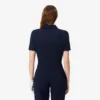 Slim fit-pikétröja med UV-skydd och stretch för damer Slim fit-pikétröja med UV-skydd och stretch för damer