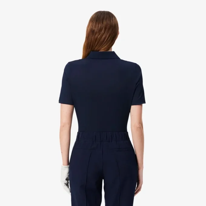 Slim fit-pikétröja med UV-skydd och stretch för damer Slim fit-pikétröja med UV-skydd och stretch för damer
