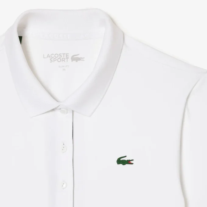 Slim fit-pikétröja med UV-skydd och stretch för damer Slim fit-pikétröja med UV-skydd och stretch för damer