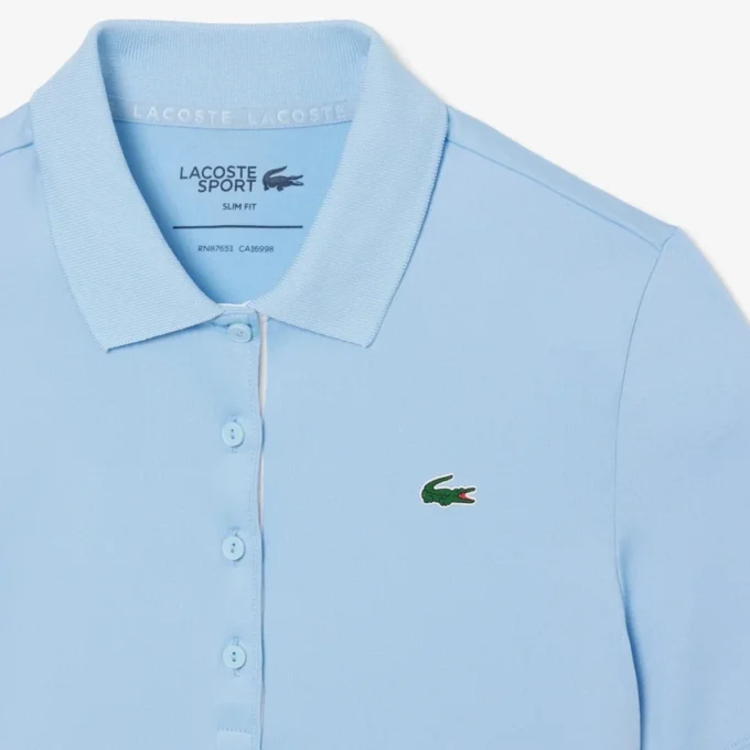 Slim fit-pikétröja med UV-skydd och stretch för damer Slim fit-pikétröja med UV-skydd och stretch för damer